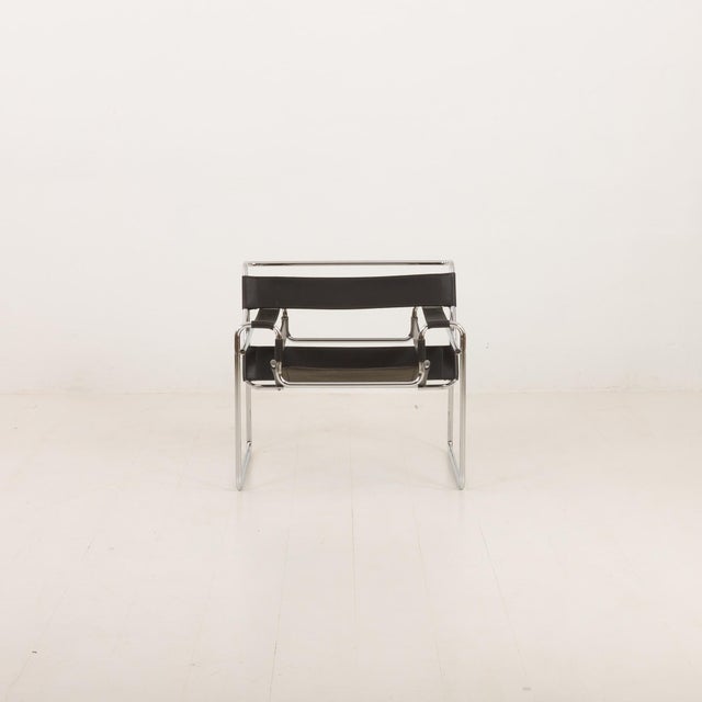 This pair of iconic Wassily Chairs designed by Marcel Breuer in 1925, were produced by Italian furniture manufacturer...