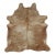 Rug & Kilim’s Contemporary Cowhide Rug With Wavy Stripes in Brown & Beige Tones For Sale