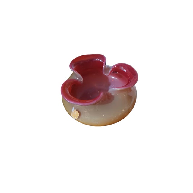 Vintage pink and gold Bohemian glass vase with ruffled detail. Vase has original Bohemian glass sticker. Comes with wooden...