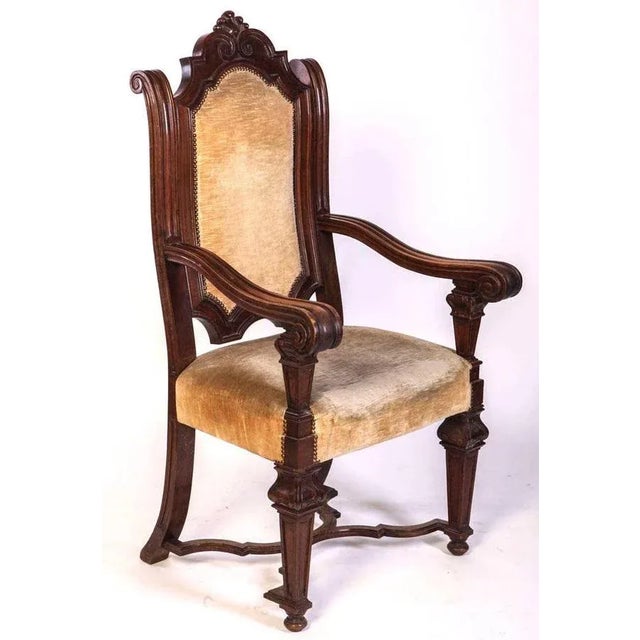Elegant set of Italian Renaissance Revival 6 chairs and 2 armchairs. May benefit from reupholstery.