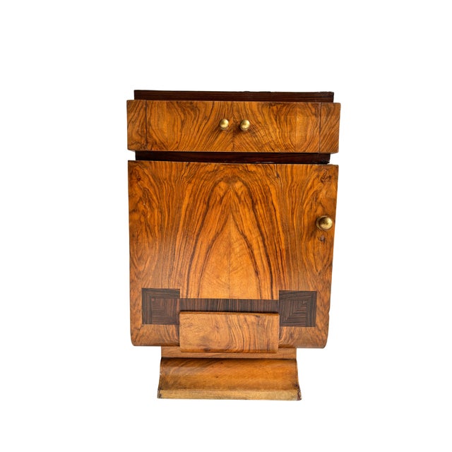 A stunning set of Art Deco bedside tables crafted from high-quality walnut, a noble material prized for its durability and...