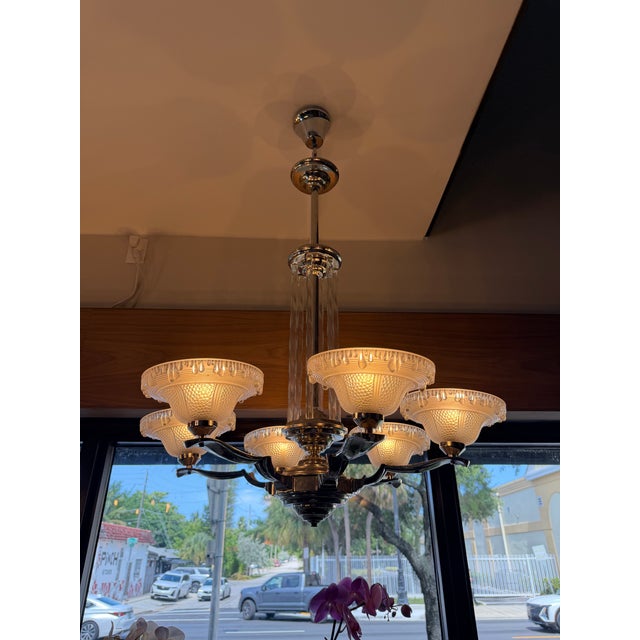 French Art Deco chandelier, Circa 1925-1935 commonly associated with designers like Henri Petitot or Jean Boris Lacroix....