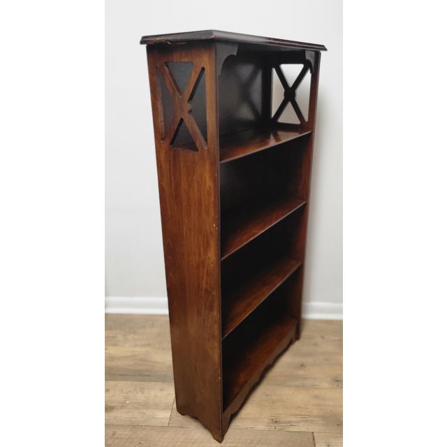 MCM Walnut book or display shelf with X-shaped pierced fretwork on sides of top shelf 24 in wide x 9 in deep x 36 in high