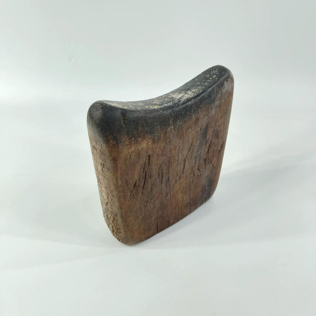 Ethiopian headrests come in various forms. They range from simple to elaborately carved artifacts. They have abstract...
