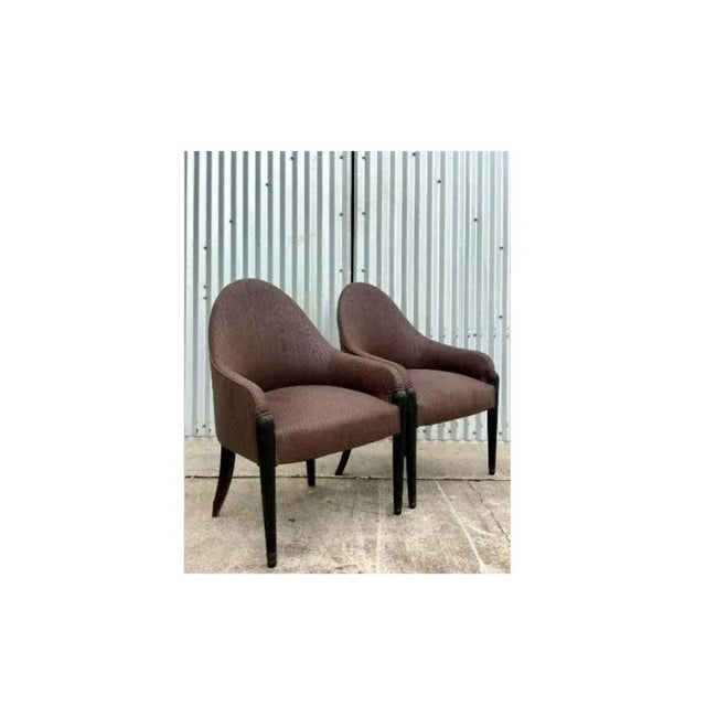 Fantastic pair of vintage quilted brown side chairs. A beautiful sloped high back gives these chairs a distinctive...