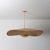 A dialogue between form and material, this nature-inspired design undulates with charm. The interplay of woven rattan and...