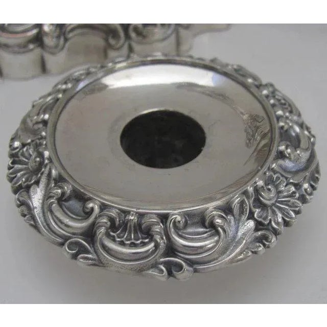 Pair of wonderful large Sheffield candlesticks. Some blush. Repousse work in scroll and floral patterns. EX: McKinley Hill...