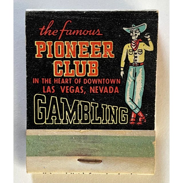 Vintage Pioneer Club of Las Vegas matchbook. 3 dimensional matchbook is mounted inside a black shadowbox frame with glass....