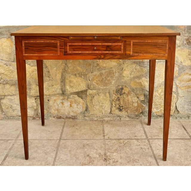 An attractive antique Victorian French lady's writing desk or dressing table with fine marquetry in kingwood, featuring a...