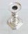 Silver-plate candlestick in a Queen Anne style. Square base with graduated molding. Makers mark to the underside, see...