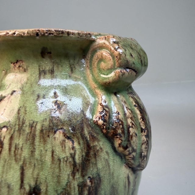 A distinctive pair of ceramic vases from calabria, southern italy, dating from the 1950s. their elegant, elongated...