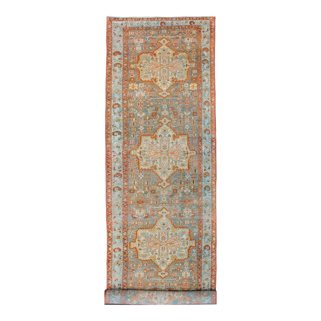 Antique Persian Malayer Runner Featuring Soft Blue and Terracotta Medallions For Sale