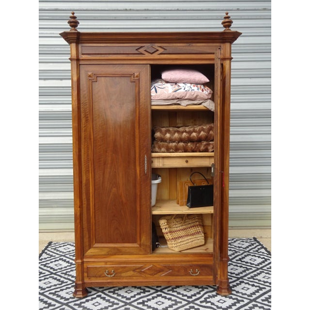 Large solid walnut linen cupboard, traditionally made in France around 1920, in the Louis Philippe style. A simple piece...