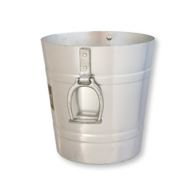 This vintage Perrier-Jouët champagne bucket pairs classic French barware design with an equestrian twist. Crafted in...