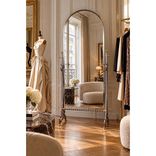 Elegant Italian Mid-Century Modern Psyche, or Cheval Mirror, dating from the 1970s, featuring a sophisticated brushed iron...