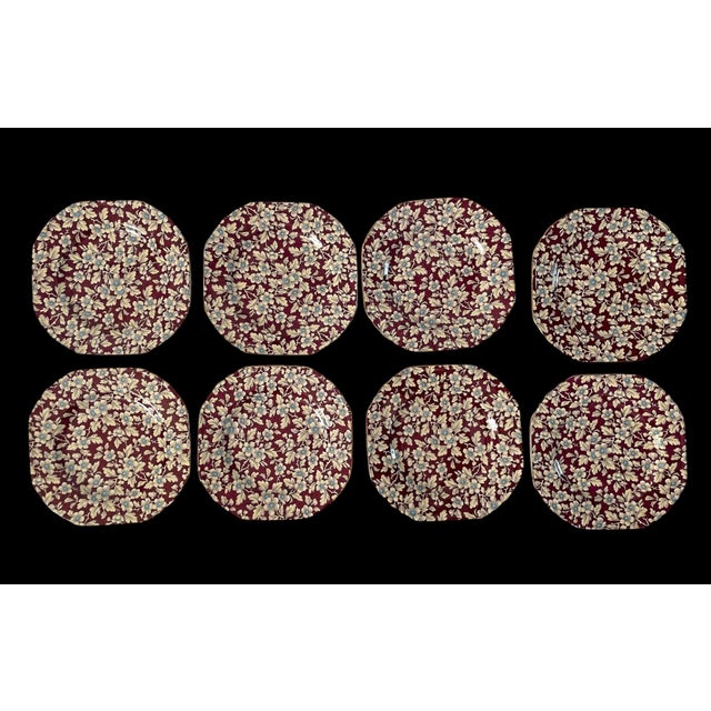 The LORD NELSON WARE Royal Brocade Burgundy Chintz Salad or Dessert Plates are a set of 8 square-shaped plates made of...