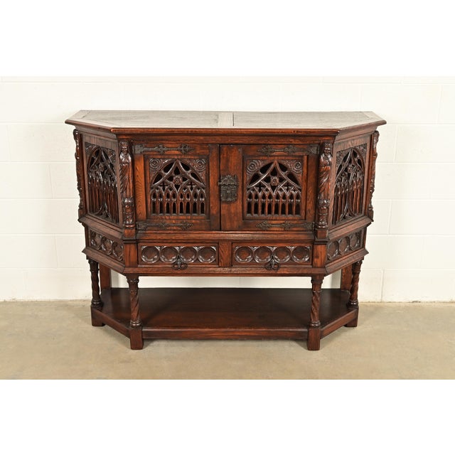 A gorgeous antique Gothic Revival or Renaissance Revival sideboard or bar cabinet France, Late 19th Century Oak, with...