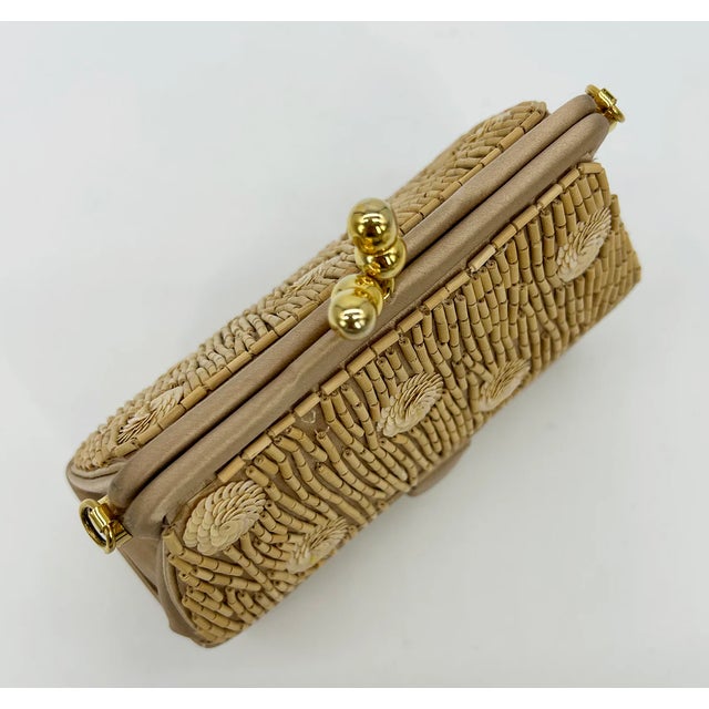 Judith Leiber Vintage Tan Silk Wood Bead Sequin Two Tier Minaudiere Bag in good condition. Tan silk exterior with very...