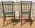 Elegant 19th C faux- bamboo turned wood side chairs with natural rush seats. There are canvas covers for both seats. Note...