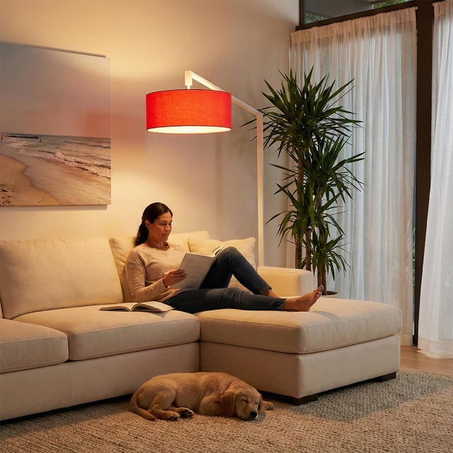 The Stretch Arc Lamp is a modern design by Kirby Groce, featuring a striking architectural silhouette that serves as a...