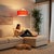 The Stretch Arc Lamp is a modern design by Kirby Groce, featuring a striking architectural silhouette that serves as a...