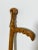 A pair of folk art hand carved canes or walking sticks and a small stick by Joseph Deveau (1901-1999). Deveau lived most...