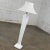 Gorgeous vintage Art Deco Revival to Postmodern Paolo Gucci floor lamp comprised of white sculpted resin and the original...