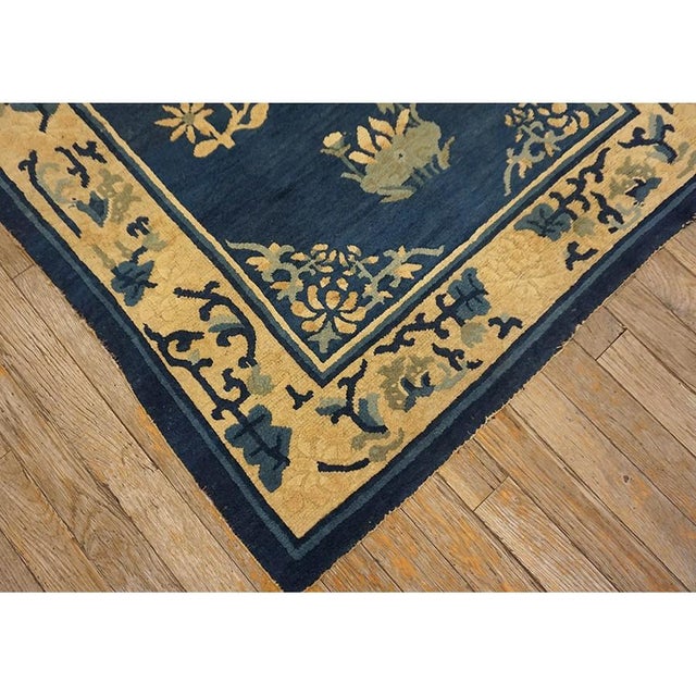 1920s Chinese Antique Small Scatter Size - Peking Blue Wool Rectangle Knotted Rug, Circa Date: 1920s. This exceptional...