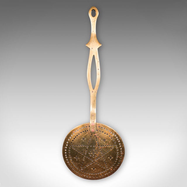 This is an antique chestnut warmer. An English, brass fireside crumpet toaster, dating to the Georgian period, circa 1800....