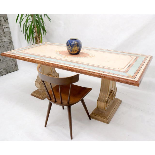 Enamel decorated marble-top rectangular dining table on carved lyre gold decorated base.