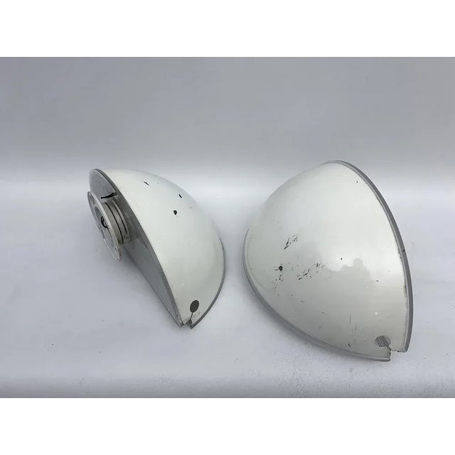 Poor vintage condition with evident trace of age and use included some loss of lacquer. One lamp has a slight deformation...