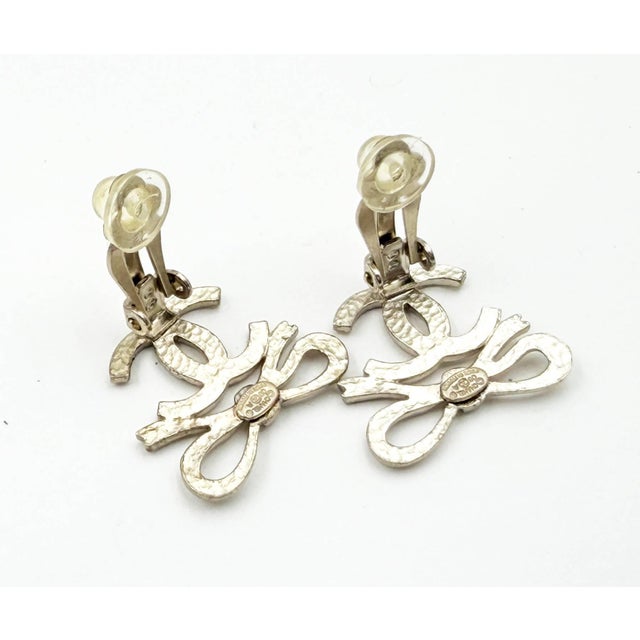 Contemporary Chanel Light Gold Ribbon Bow CC Clip on Earrings, A Pair For Sale - Image 3 of 4