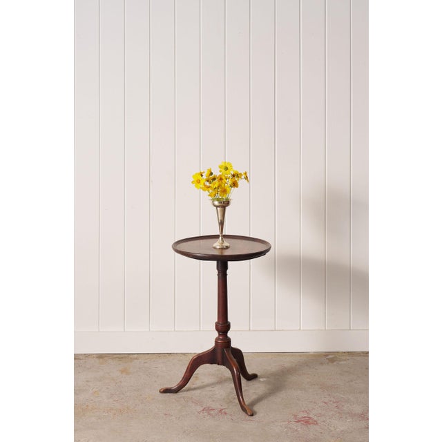 Georgian walnut wine table with a circular top, turned pedestal base, and classic proportions. A versatile accent table...