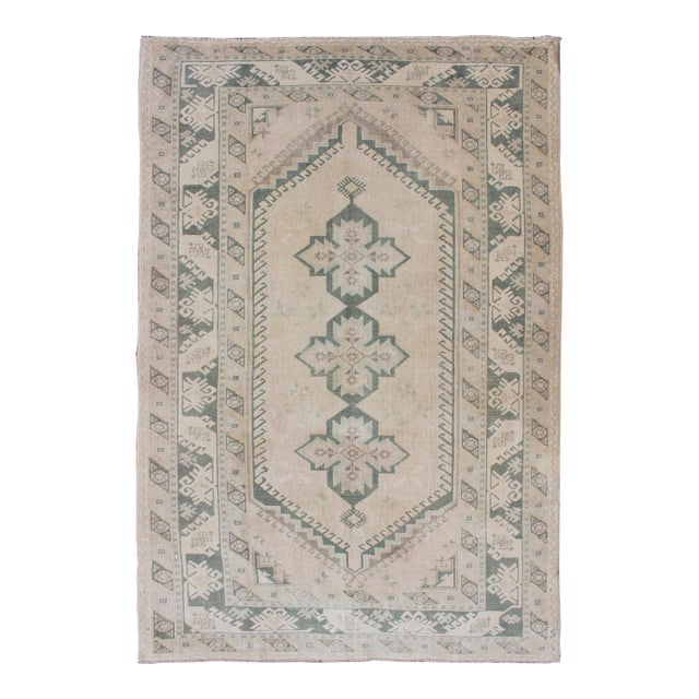 Vintage Turkish Oushak Rug With Soft Beige Field and Faded Green 4'6 X 7'0 For Sale