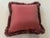 A charming floral pillow in a Pierre Frey fabric having feather-like ribbons cascading throughout in tapestry stitching....