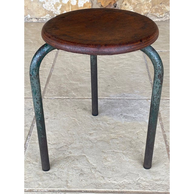 Vintage, tripod stool / school stool, in the style of French designer, Jean Prouve, circa, 1940's/1950's. Stool rests on a...