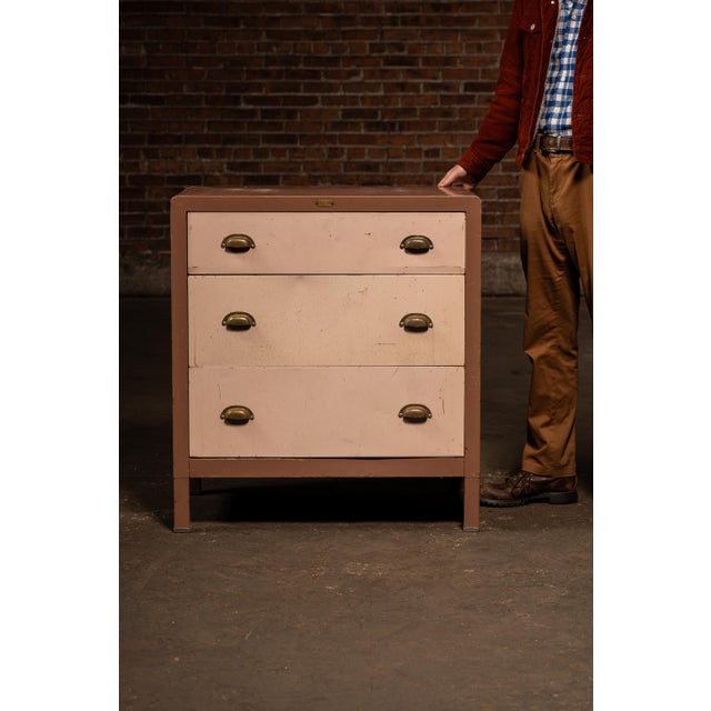 c. 1940s-1950s; Simmons Manufacturing Co. - Kenosha, WI A streamlined, steel-framed three-drawer dresser finished in its...