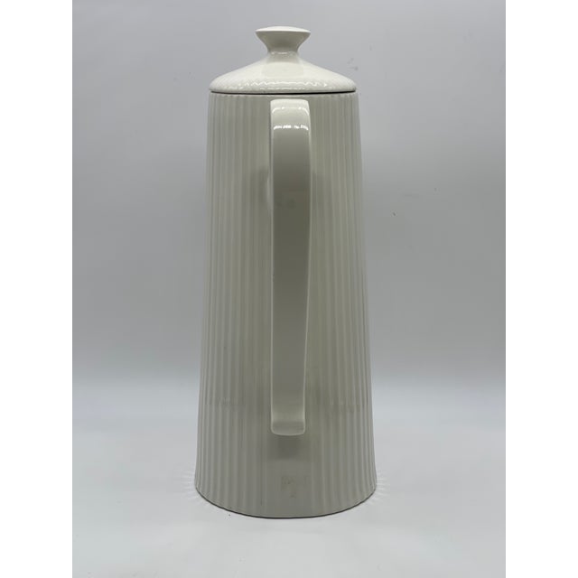 Vintage large ribbed coffee pot / server designed by Ernest Sohn and produced by Hall in the 1950s. Named the "Doric...