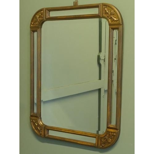 French Art Deco Style Gilt Cushion Mirror The central bevelled mirror has a double 3” wide diamond cut mirror and gilt...