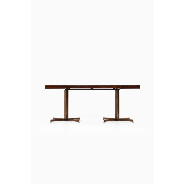 Rare dining table by unknown designer. Produced in Italy. Dimensions (W x D x H): 180,5 ( 256 ) x 84 x 72 cm.