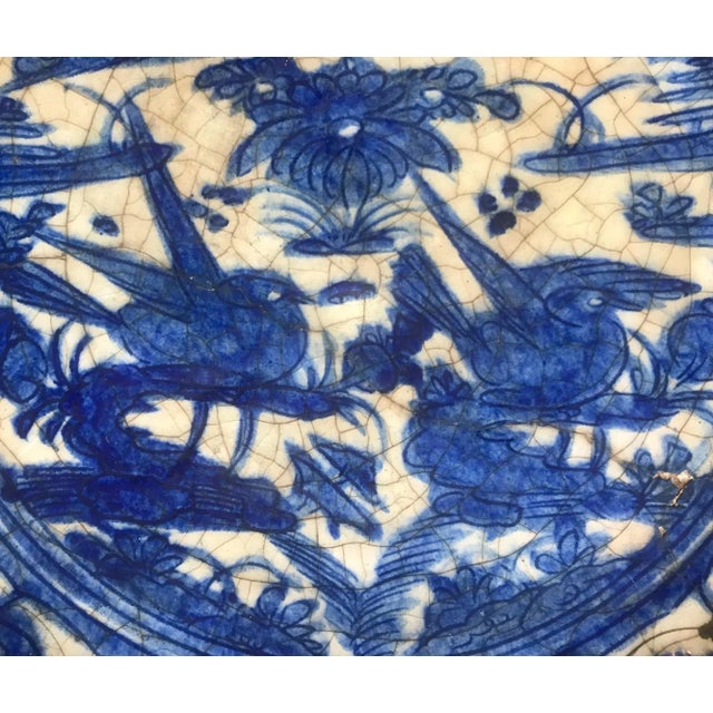 Extremely Rare Islamic Safavid Blue and White Large Dish Persian 16th Century. This Safavid fritware dish is painted under...