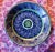 Handpainted MidEastern plate, intricate design, with deep blues, yellow, persimmon, greens. Beautiful signature, not able...