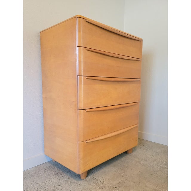 Circa 1950 A handsome High Boy Dresser from Heywood Wakefield’s Encore Collection. Features solid Birch construction with...