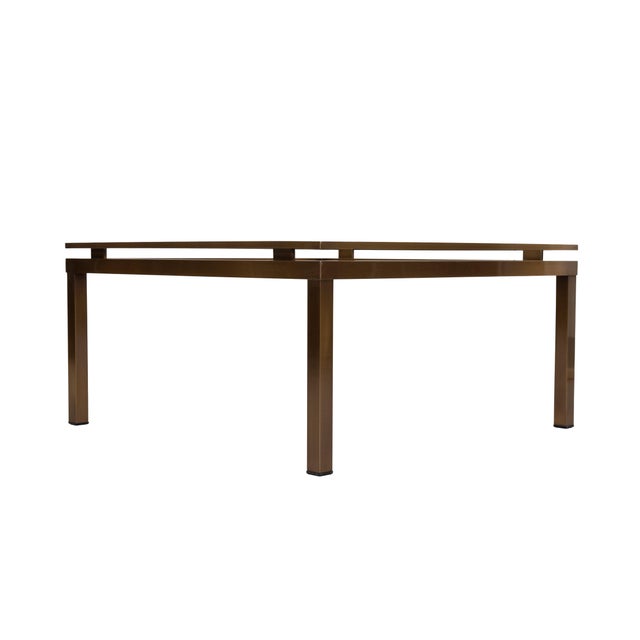 Beautiful square Coffee table. Bronze colored Brass. floating Glass top. So stylish. Attributed to Maison Jansen. This...