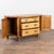 This 19th-century Swedish pine sideboard features deep canted sides with paneled cabinet doors, creating a compact yet...