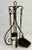 Late 20th century iron fireplace tool set. This is an impressive tool set likely an antique reproduction, possibly by...