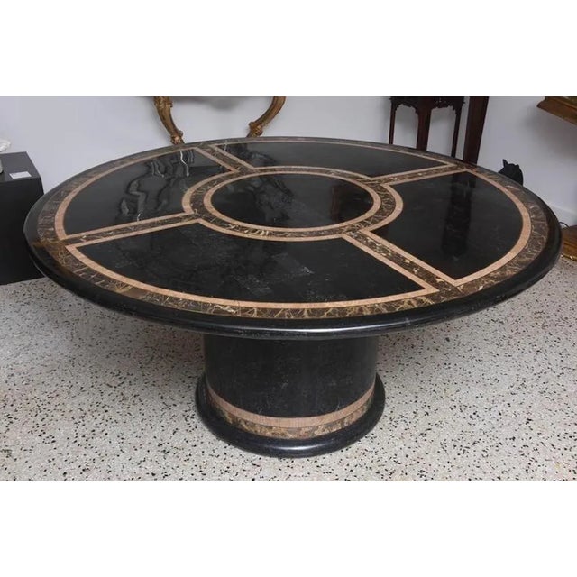 These stylish and chic dining table and chairs are attributed to Maitland Smith, and date to the late 1980s to early...