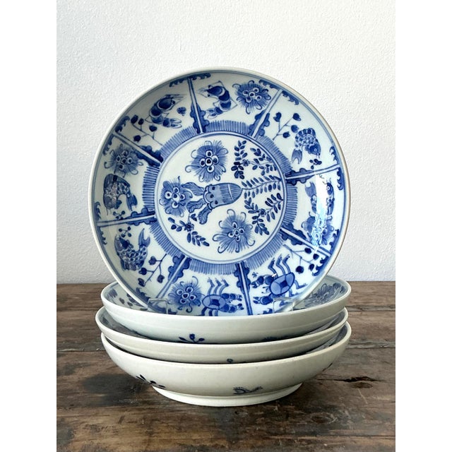 This exquisite set of four vintage Asian ceramic plates showcases the timeless beauty and refined artistry of Chinoiserie...