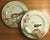 Pair Antique Mintons porcelain cabinet plates decorated with hand painted exotic birds in a fanciful landscape on a...