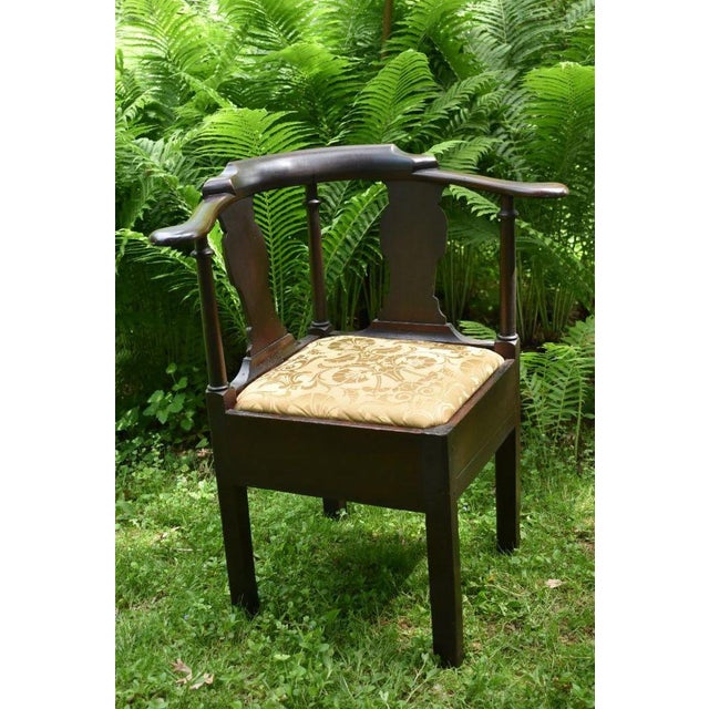18th century English mahogany Chippendale corner chair in recent appropriate damask covered slip seat. A restored chair...